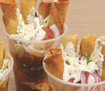 Tacos dorados en vaso